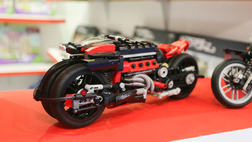 toy motorbike in playworld village at paperworld middle east