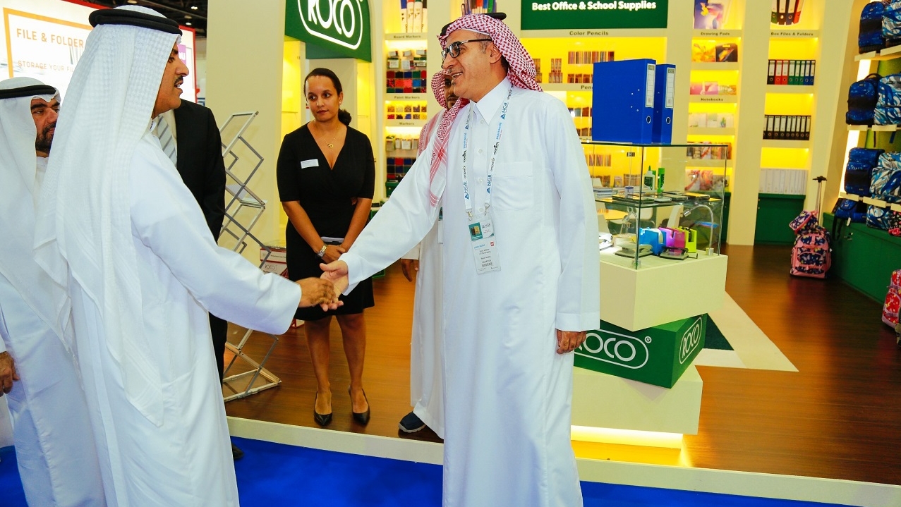 Exhibitor handshake at Paperworld Middle East